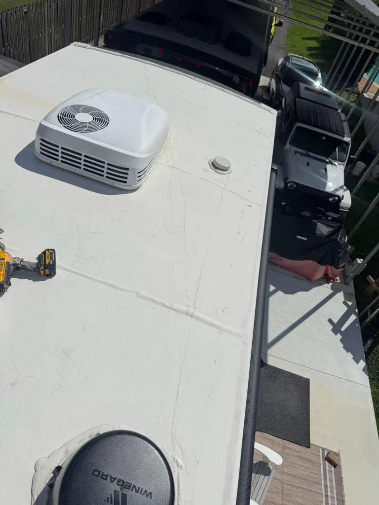 Professional heat pump service on a recreational vehicle